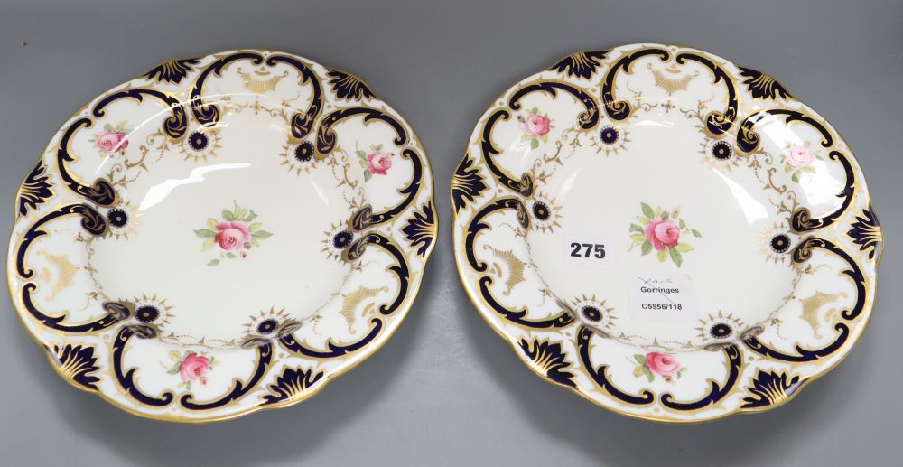 A pair of Coalport floral painted dessert plates, diameter 26cm